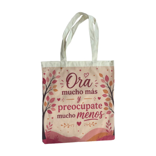 Tote bag con la frase impresa Ora mucho más y preocúpate menos