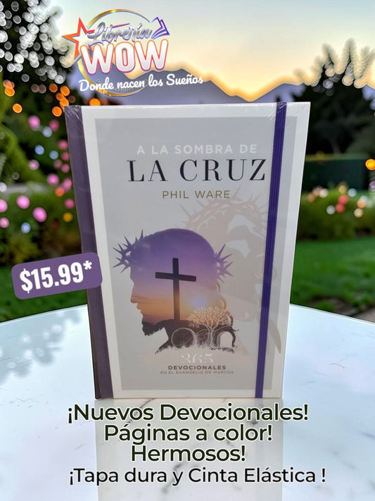A la Sombra de la Cruz hardcover devotional book by Phil Ware with a purple elastic band and full-color pages.