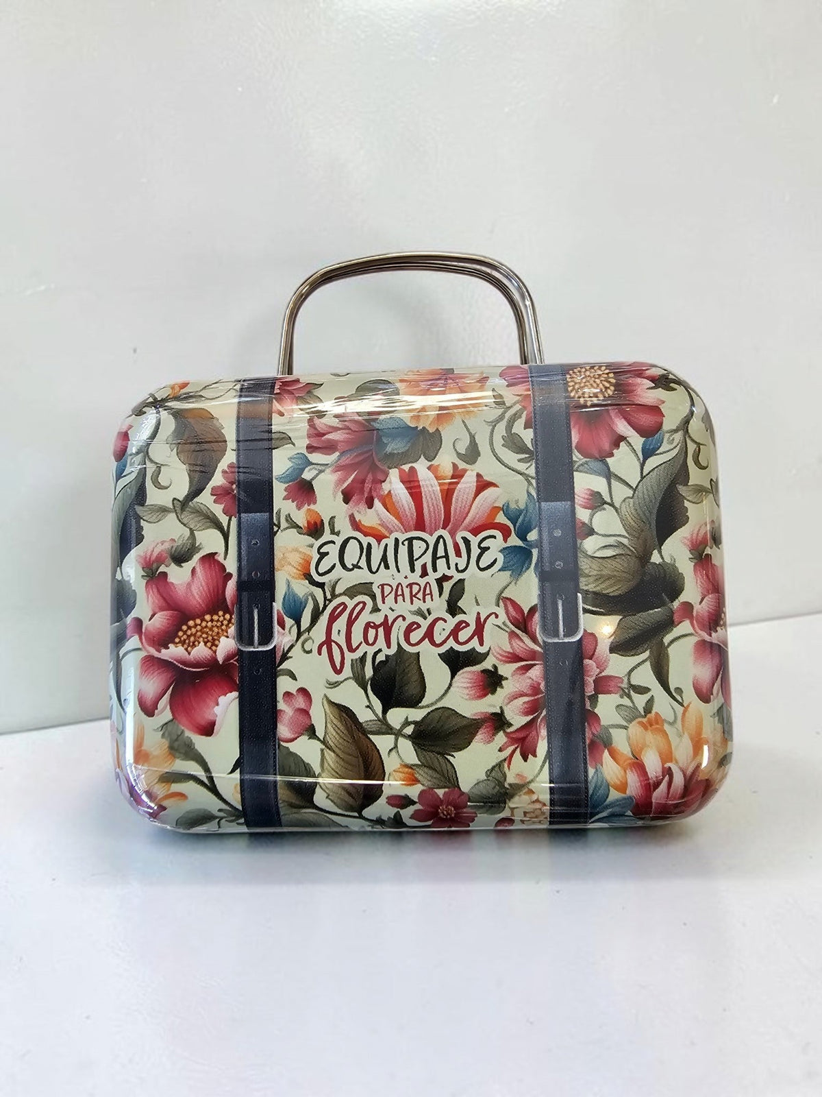 Maleta decorativa Libreria Wow de metal con estampado floral vintage y asa metálica, ideal para almacenamiento elegante.